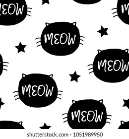 Vector seamless background pattern with kitten heads and stars