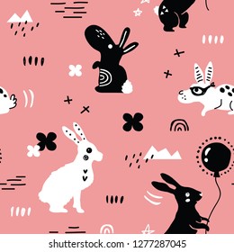vector seamless background pattern with ornate easter rabbits and elements in scandinavian style  for  fabric design, wrapping paper, notebooks covers.textile