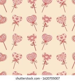 Vector seamless background with red lollipop candies in the form of hearts on beige background. Love, romantic or valentine's day seamless pattern. Print on paper, invitations, background
