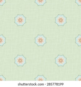 Vector seamless background. Round floral pattern in vintage style and delicate canvas texture.