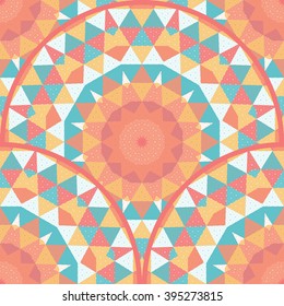 Vector seamless background with round pattern of triangles.