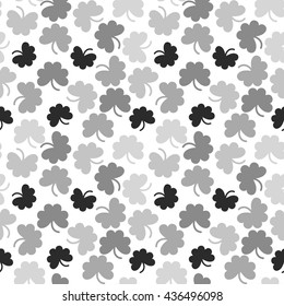 vector seamless background with shamrock