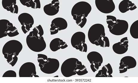 Vector seamless background of skulls. Chaotic skull