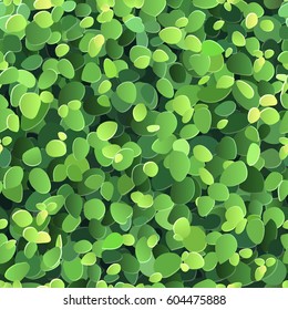 Vector seamless background with stylized green leaves.