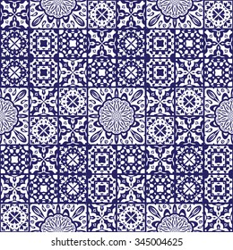 Vector seamless background of tiles decorated with patterns. Stylized flowers, geometric shapes. Dark blue and white abstract tile.