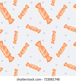 Vector seamless background with toffee candies in flat style on blue dotted background.