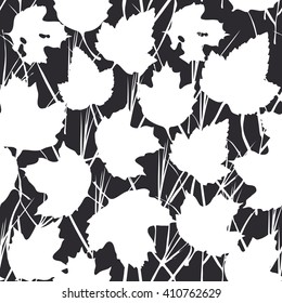 Vector seamless background with white maple leaves  for fashion textile or web background. silhouette on Black background. Vector