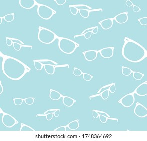 Vector seamless background. White sunglasses on a blue pattern