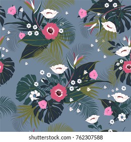vector seamless beautiful artistic tropical pattern with exotic forest. Colorful original stylish floral background print, bright rainbow flower on blue.