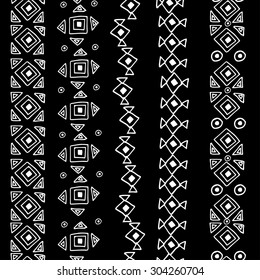 Vector seamless black and white  ethnic pattern on black