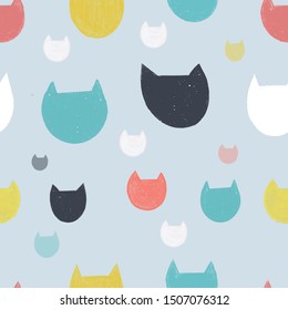 Vector seamless blue pattern background with hand drawn cat head. Scandinavian textile design background.