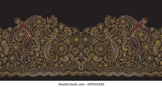 Vector seamless border in ethnic style. Exotic flying birds, golden contour thin line drawing with folk ornaments on a black background. Embroidery silhouette, wallpaper, textile print, wrapping paper