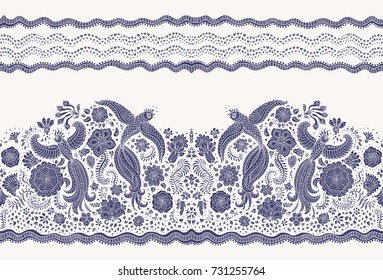 Vector seamless border in ethnic style. Exotic flying peacock birds, dark indigo blue folk ornaments on a light beige background. Embroidery, wallpaper fringe, textile print, wrapping paper