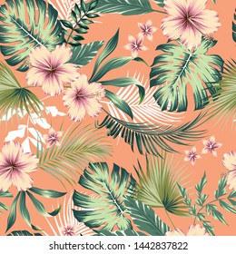 vector seamless botanical tropical pattern with flowers. Lush foliage floral design with monstera leaves, areca palm leaves, fan palm, hibiscus flower, frangipani flower. Modern allover background.