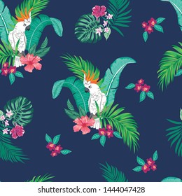 vector seamless botanical tropical pattern with parrots and flowers. Floral exotic background design with banana leaf, areca palm leaves, monstera leaves, hibiscus flowers, frangipani.