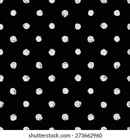 Vector seamless chalk polka dot pattern. Classic texture vintage 1960s fashion style in  white and black colors. Modern hipster background with white circles.