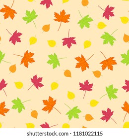 Vector seamless cheerful background of colorful autumn leaves on beige background