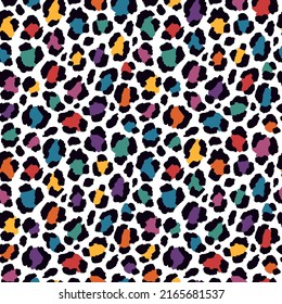 Vector seamless cheetah pattern in rainbow colors. Wild repeated texture with leopard print. Colorful artistic background. Bright colored animalistic print