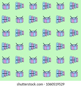 Vector seamless children`s music pattern xylophone and drum