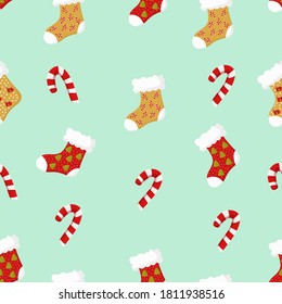 Vector seamless Christmas pattern with candy, socks. On white background