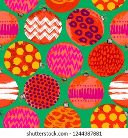 Vector seamless Christmas pattern with hand drawn Christmas ornaments and decor. Bold bright pattern for winter New Year background. Vector background with polka dot balls and circles. Winter texture