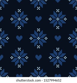 Vector seamless Christmas pattern for sweater with blue elements on dark blue background. Perfect for greeting card, fabric, wallpaper, textile, gift box, web design.