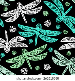 Vector seamless colorful pattern with dragonflies and flowers on black background.