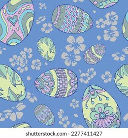 Vector seamless colorful pattern with easter eggs and cherry blossom, with blue background