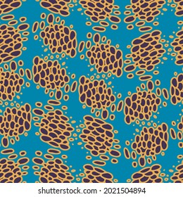 Vector seamless colorful pattern of ornamental abstract dots and circles in orange tones on dark blue. The design is perfect for sheets, backgrounds, wrapping paper, wallpaper, textiles, surfaces
