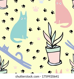 Vector seamless colorful pattern silhouettes of cats and paws on yellow background. The design is perfect for pyjamas, textiles, backgrounds, wallpapers, wrapping paper, decorations, sheets