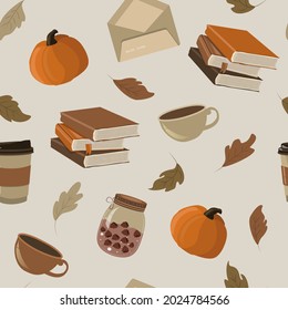 vector seamless cute autumn pattern with pumpkins, foliage, books, cups of coffee and cocoa. cozy pattern for printing on fabric, wrapping paper, wallpaper.