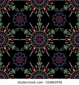Vector seamless damask pattern, classic wallpaper, background. Ornamental border in blue, green and red colors on a black background.