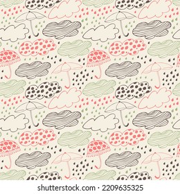 Vector seamless decorative background, pattern with clouds, umbrellas and drops of rain. Cute stylish texture with many cute details