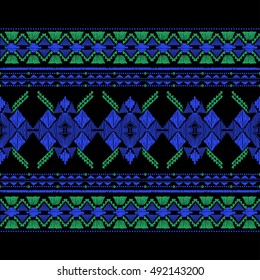 Vector seamless decorative ethnic pattern. American indian motifs. Background with aztec tribal ornament. Print for fashion, textile, paper and cover. Hand drawn elements, colorful illustration.