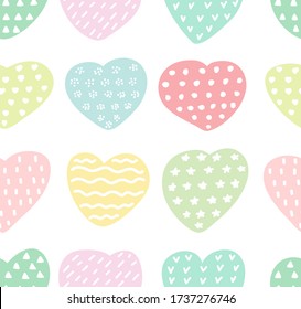 Vector seamless delicate color print of hearts of different colors hand-drawn with different prints