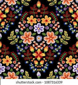 Vector seamless embroidery pattern, decorative textile ornament, pillow or bandana decor. Bohemian handmade style background design.