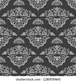 Vector seamless endless pattern. Damask pattern in white and black colors. Victorian texture, minimalistic style background. Abstract chalkboard design, perfect for fabric, wallpaper, paper print 