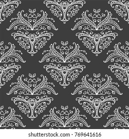 Vector seamless endless pattern. Damask pattern in white and black colors. Victorian texture, minimalistic style background. Abstract chalkboard design, perfect for fabric, wallpaper, paper print 