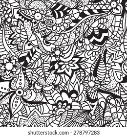 Vector seamless ethnic background. The pattern drawn by hand. Flowers and leaves. Black and white. Use for wallpaper,pattern fills, web page background.
