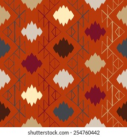Vector seamless ethnic pattern with american indian motifs in multiple colors. Colorful aztec background. Textile print with navajo tribal ornament. Native american art.