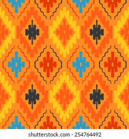 Vector seamless ethnic pattern with american indian motifs in multiple colors. Colorful aztec background. Textile print with navajo tribal ornament. Native american art.