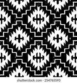 Vector seamless ethnic pattern with american indian motifs in black and white colors. Aztec background. Textile print with navajo tribal ornament. Native american art.