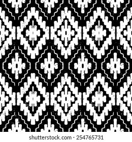 Vector seamless ethnic pattern with american indian motifs in black and white colors. Aztec background. Textile print with navajo tribal ornament. Native american art.