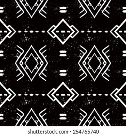 Vector seamless ethnic pattern with american indian motifs in black and white colors. Aztec background. Textile print with navajo tribal ornament. Native american art.