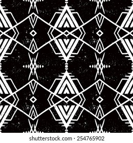 Vector seamless ethnic pattern with american indian motifs in black and white colors. Aztec background. Textile print with navajo tribal ornament. Native american art.