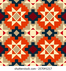 Vector seamless ethnic pattern with american indian motifs in multiple colors. Colorful aztec background. Textile print with navajo tribal ornament. Native american art.