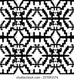 Vector seamless ethnic pattern with american indian motifs in black and white colors. Aztec background. Textile print with navajo tribal ornament. Native american art.