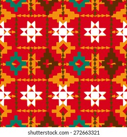 Vector seamless ethnic pattern with american indian motifs in multiple colors. Colorful aztec background. Textile print with navajo tribal ornament. Native american art.