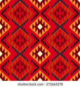Vector seamless ethnic pattern with american indian motifs in multiple colors. Colorful aztec background. Textile print with navajo tribal ornament. Native american art.