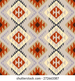 Vector seamless ethnic pattern with american indian motifs in multiple colors. Colorful aztec background. Textile print with navajo tribal ornament. Native american art.